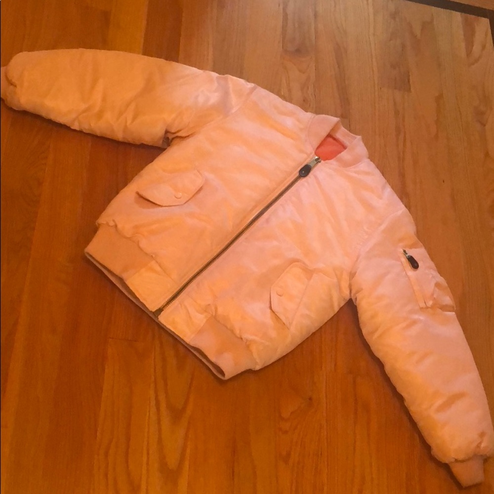 light pink bomber with orange lining